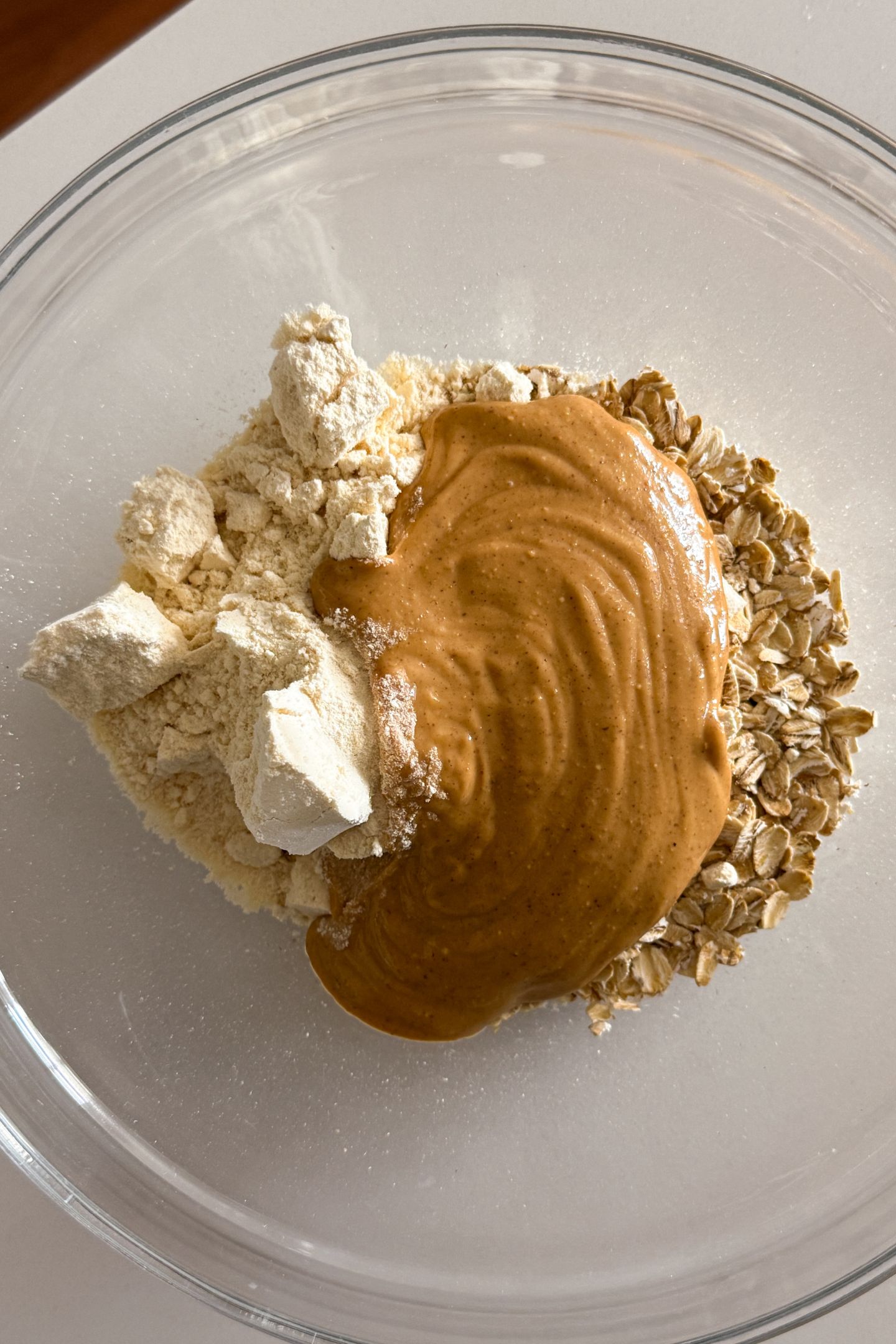 Ingredients to make the protein balls in a large mixing bowl.
