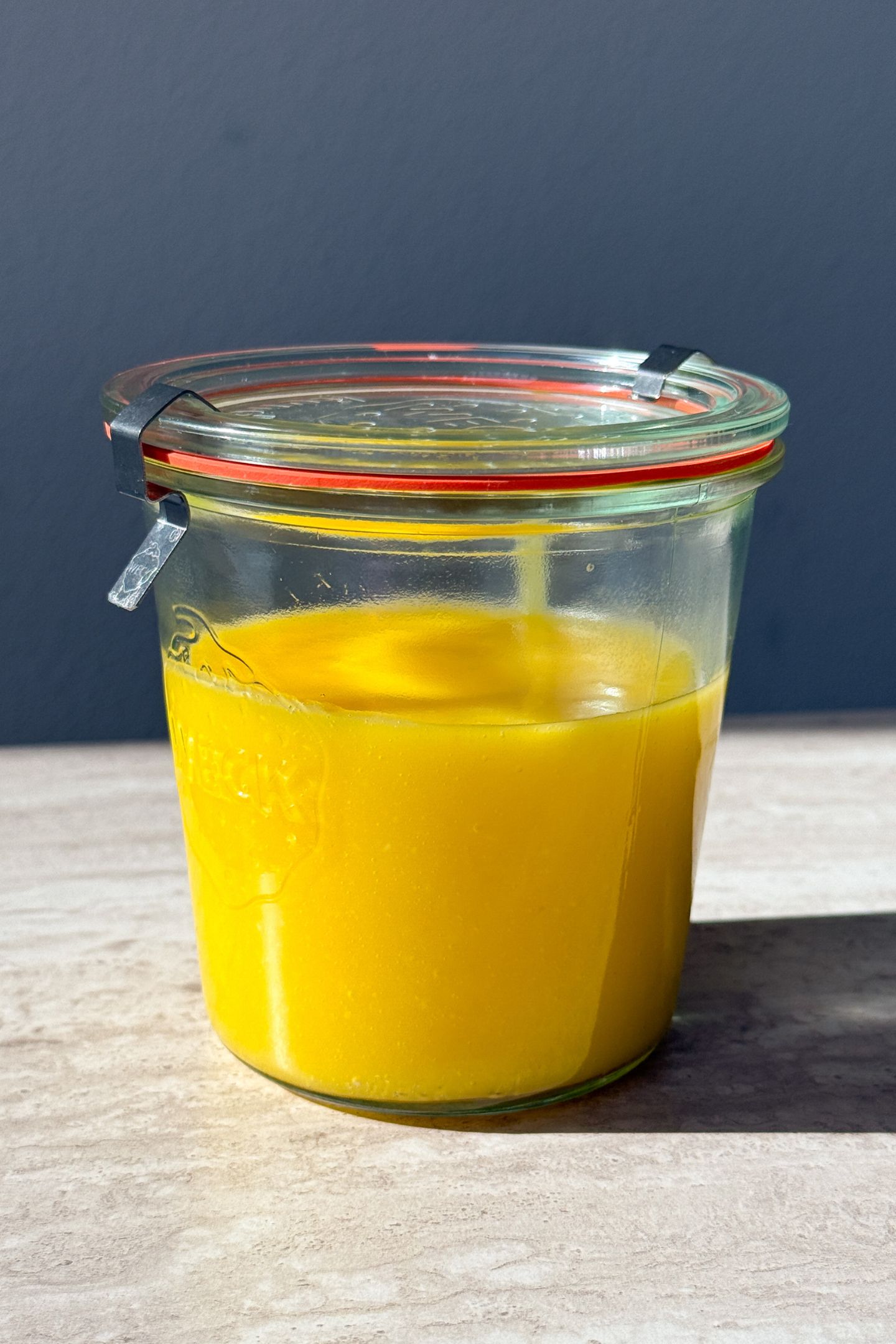 Lemon curd in a mason jar.