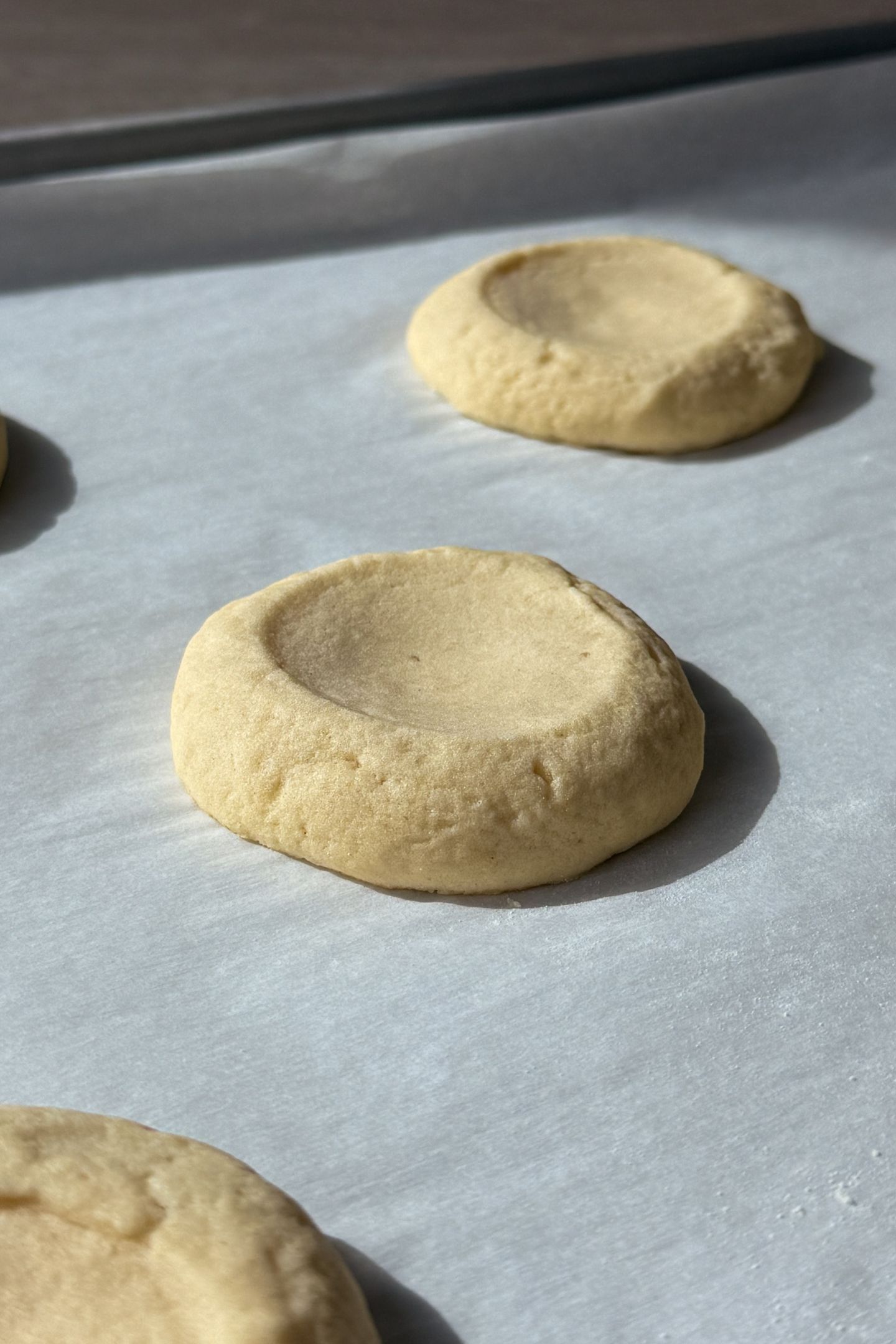 Baked cookies on parchment paper.