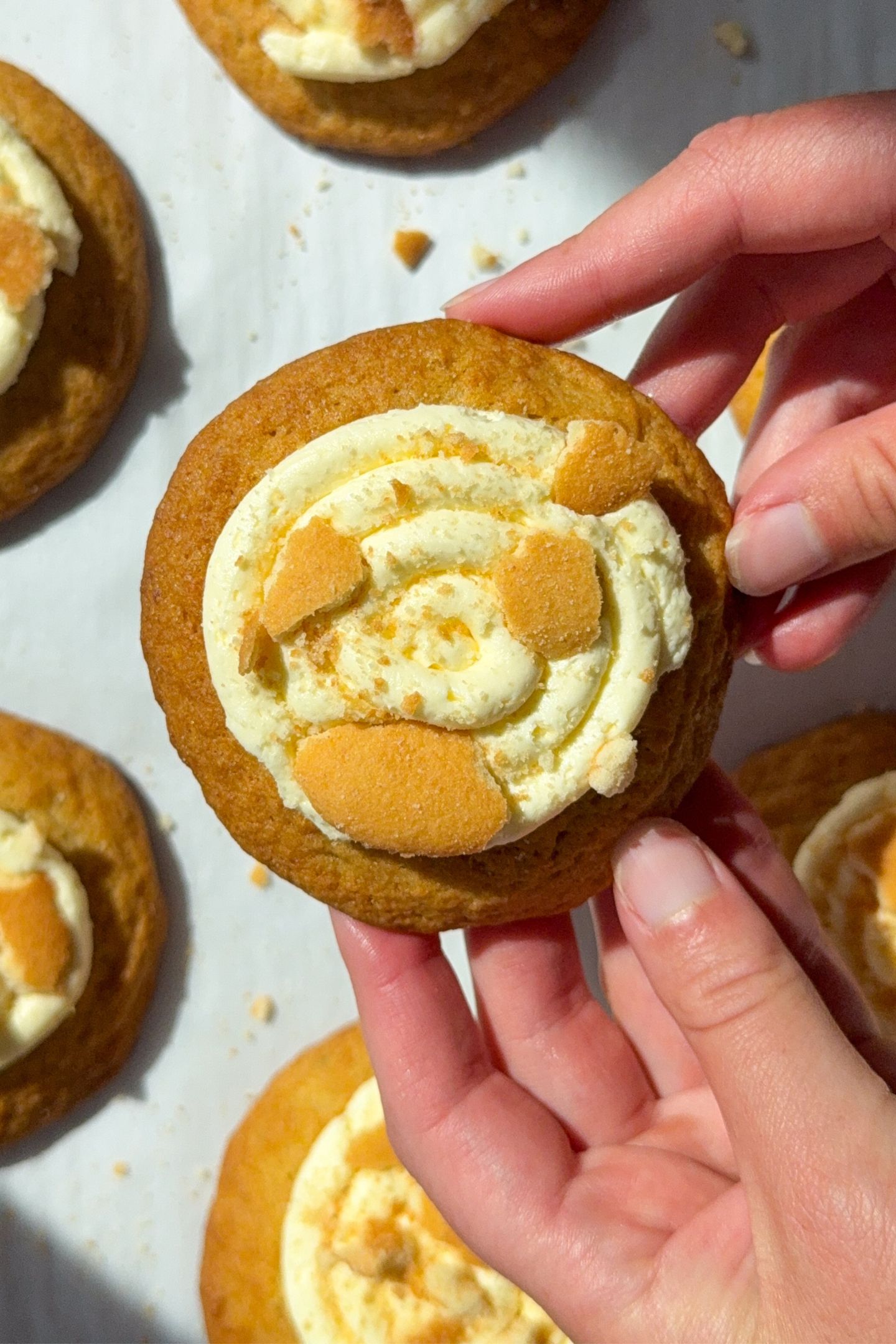 Holding a banana pudding cookie in my hand.