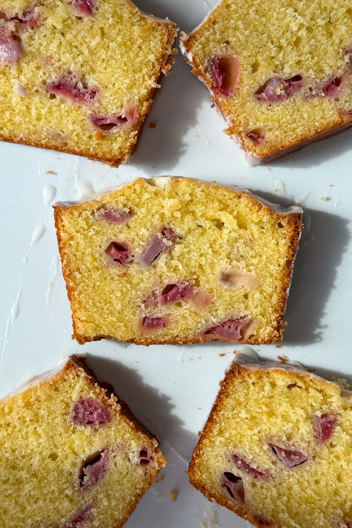 Slices of Strawberry Lemon Pound Cake on a serving plate.
