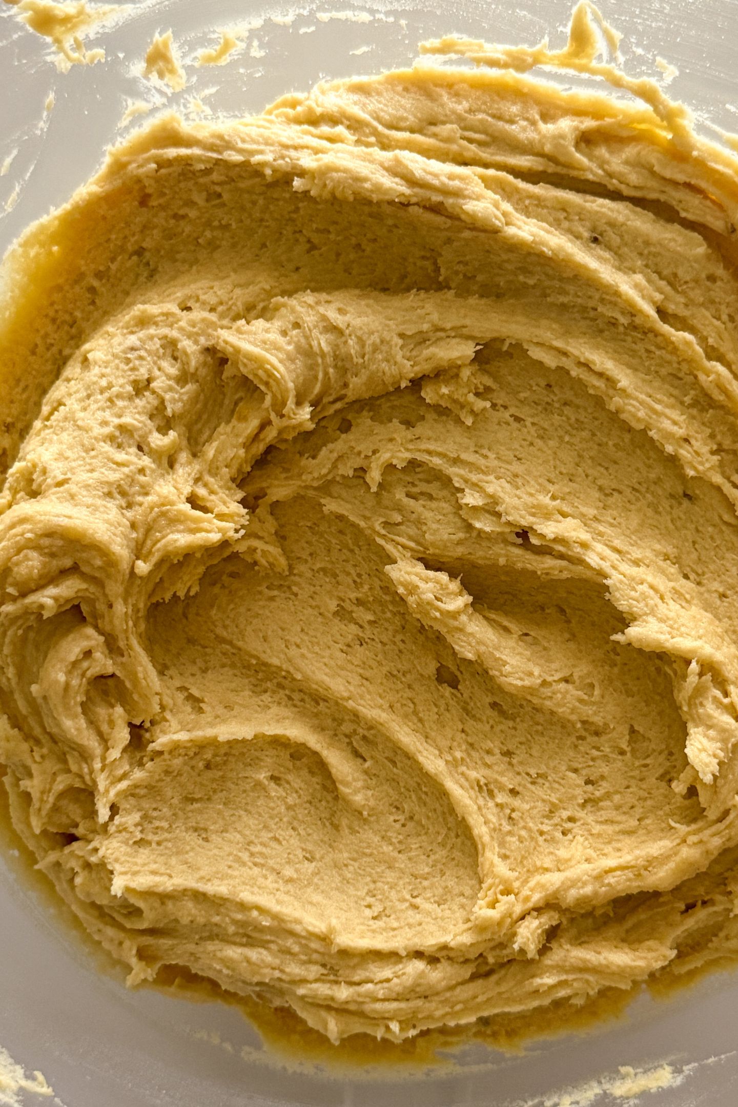 Banana pudding cookie dough chilled in a bowl.