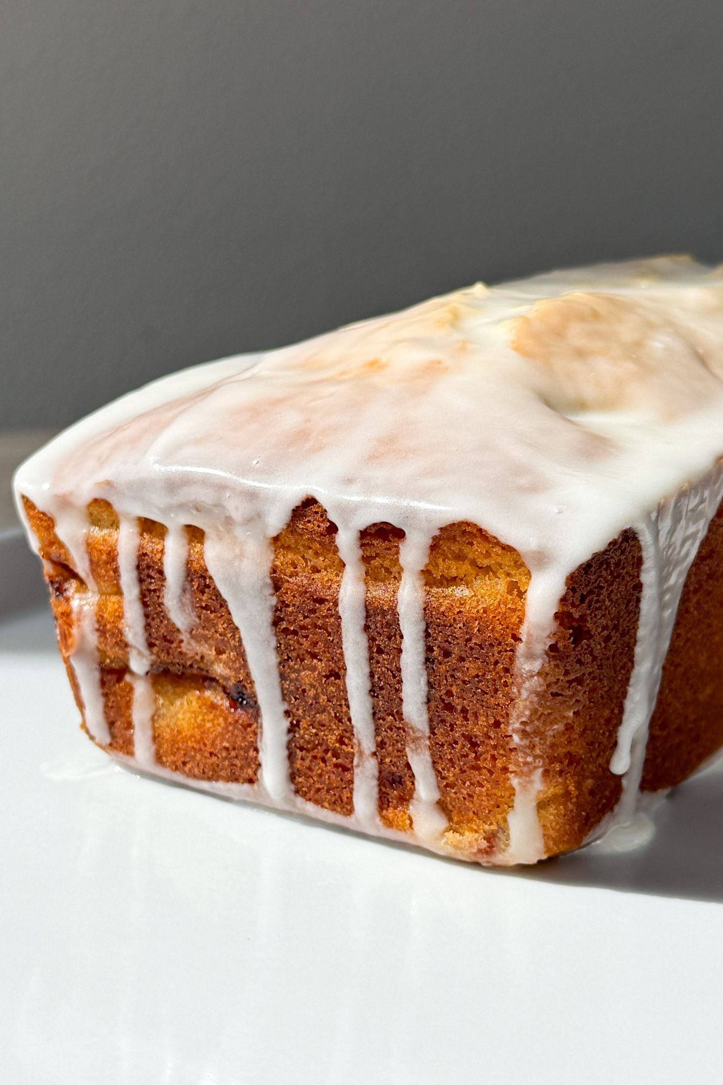 Strawberry Lemon Pound Cake topped with a Lemon Glaze.
