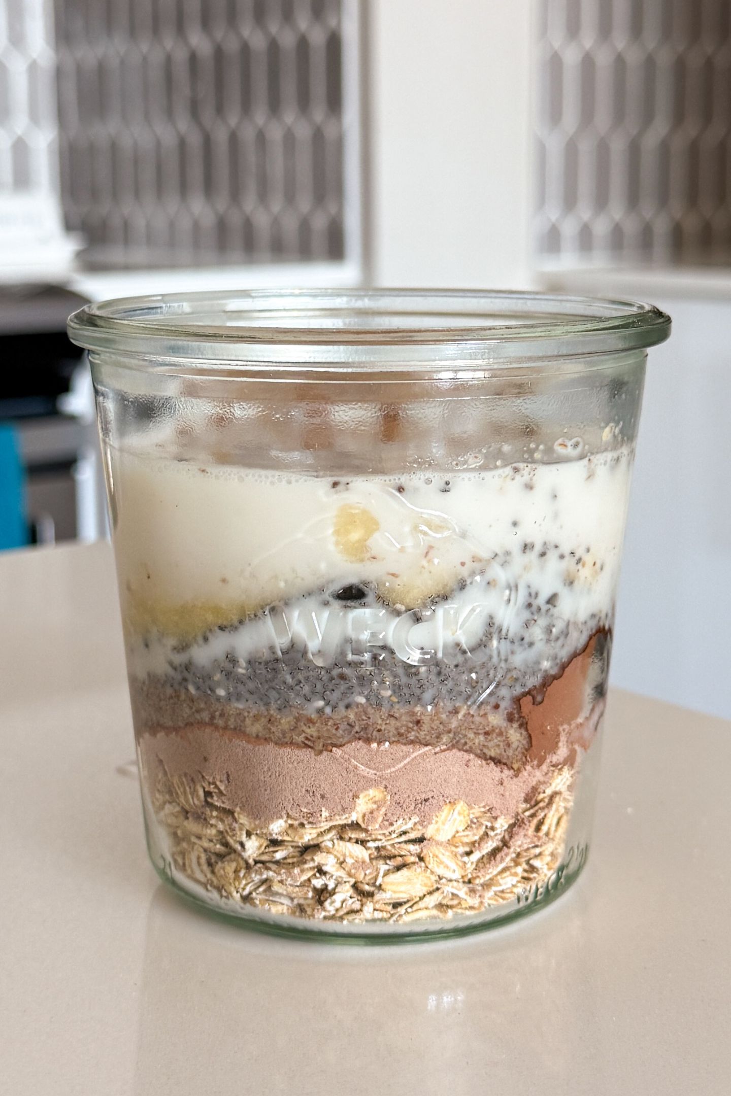 Liquid ingredients added to the dry in the large mason jar.