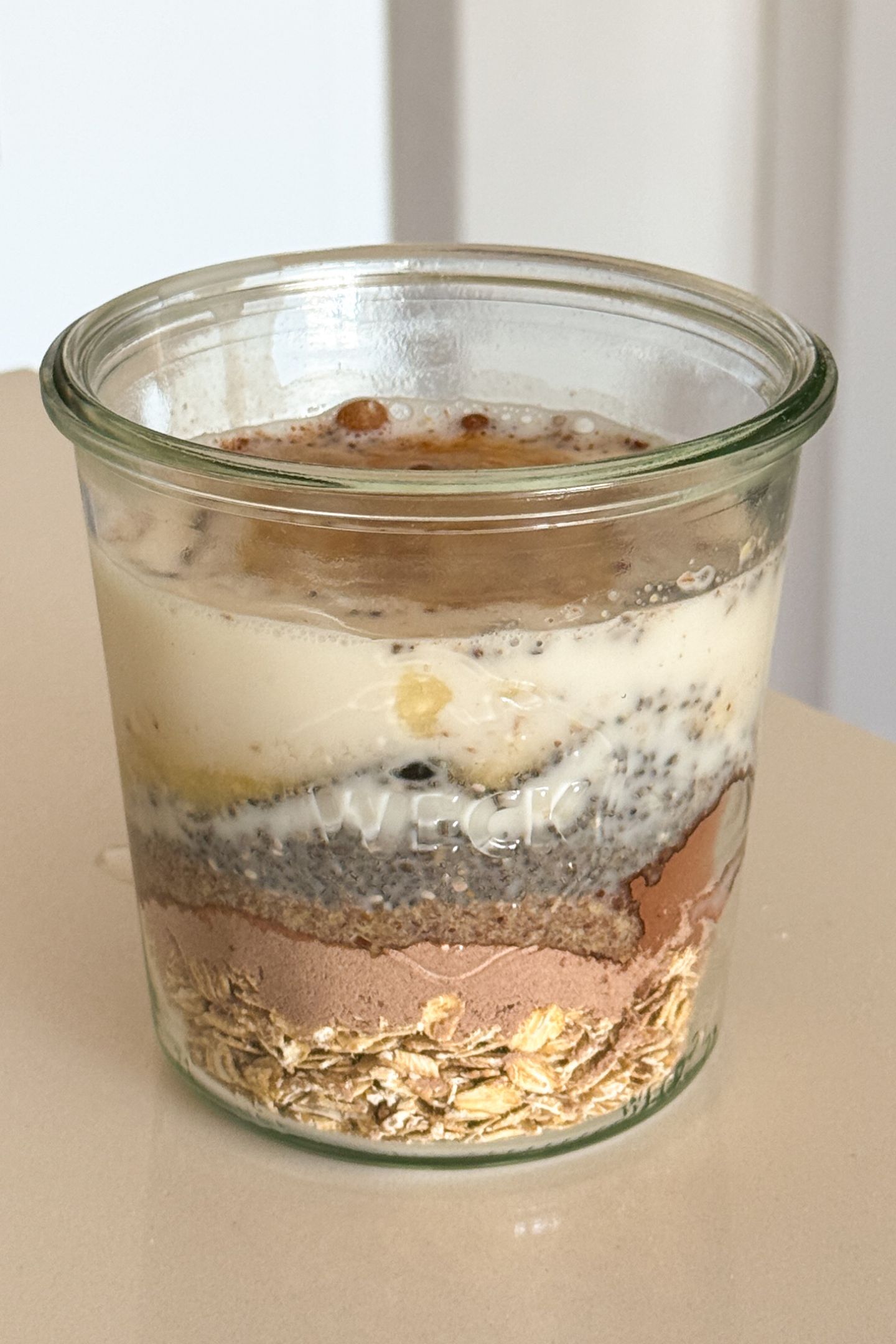 Liquid ingredients added to the dry in the large mason jar.