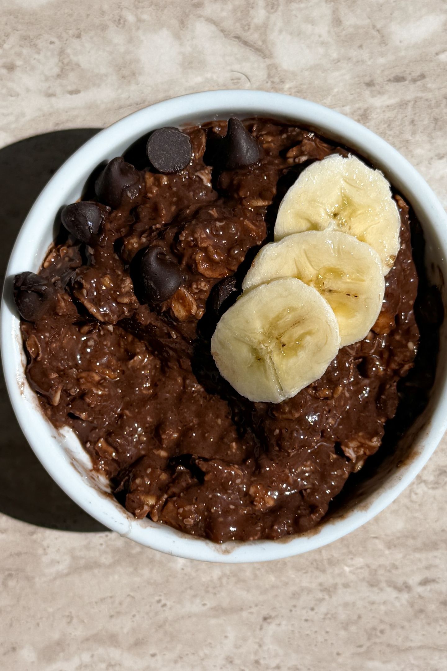 Eating the chocolate and banana overnight oatmeal.