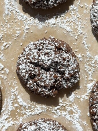 Chocolate Cake Mix Cookie topped with powdered sugar.
