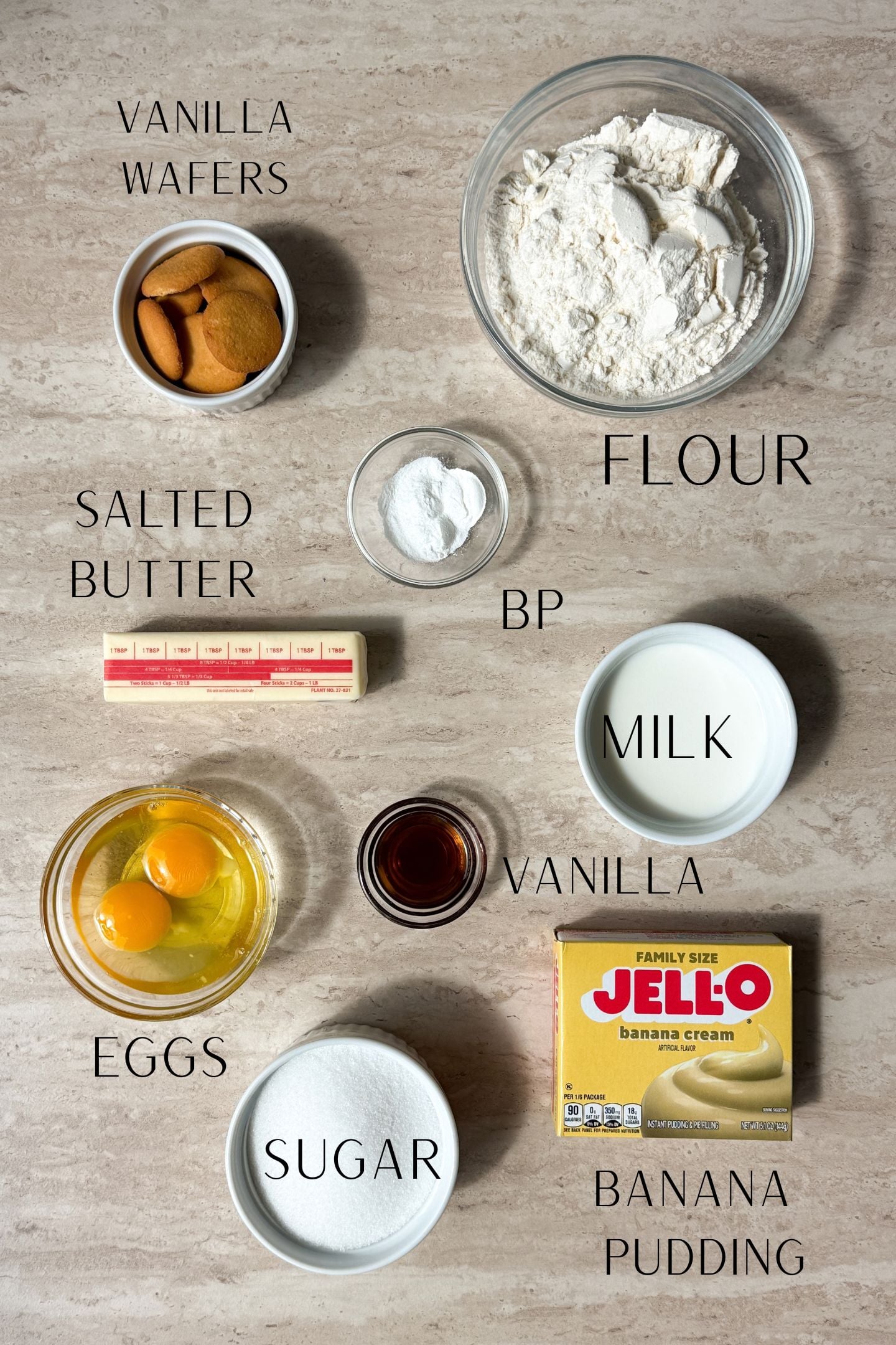 Banana Pudding Cupcake Ingredients measured out in bowls.