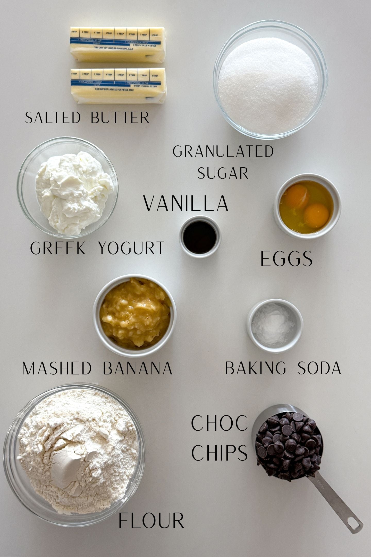Ingredients measured out in bowls to make the banana chocolate chip bundt cake.