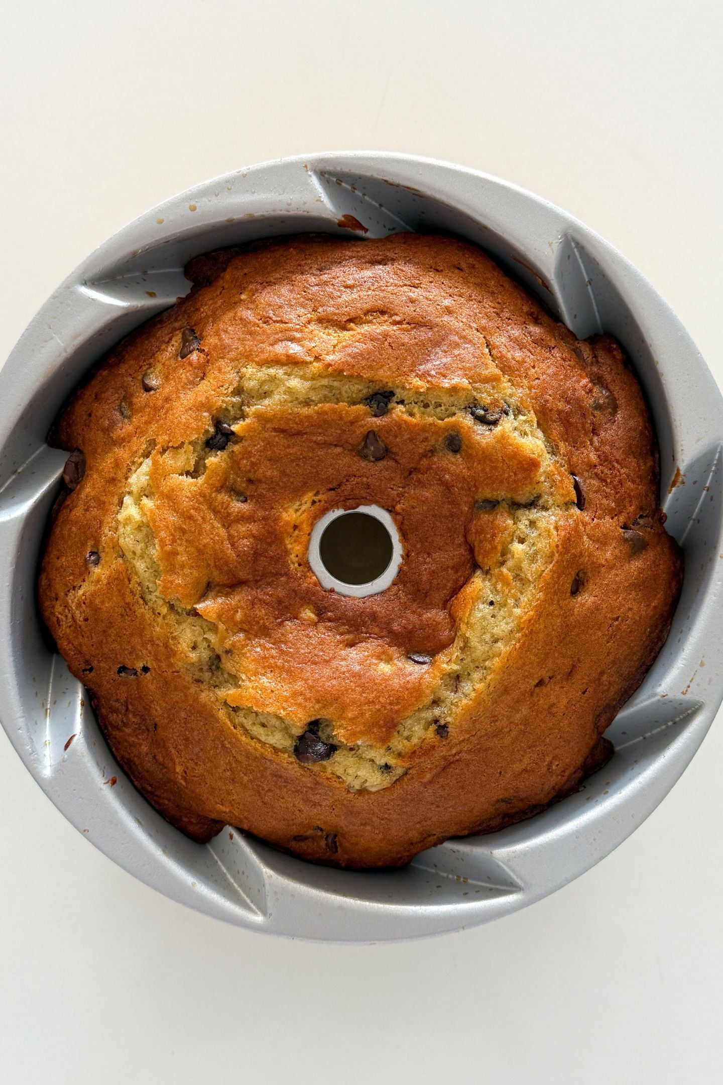 Banana chocolate chip bundt cake baked in the pan.