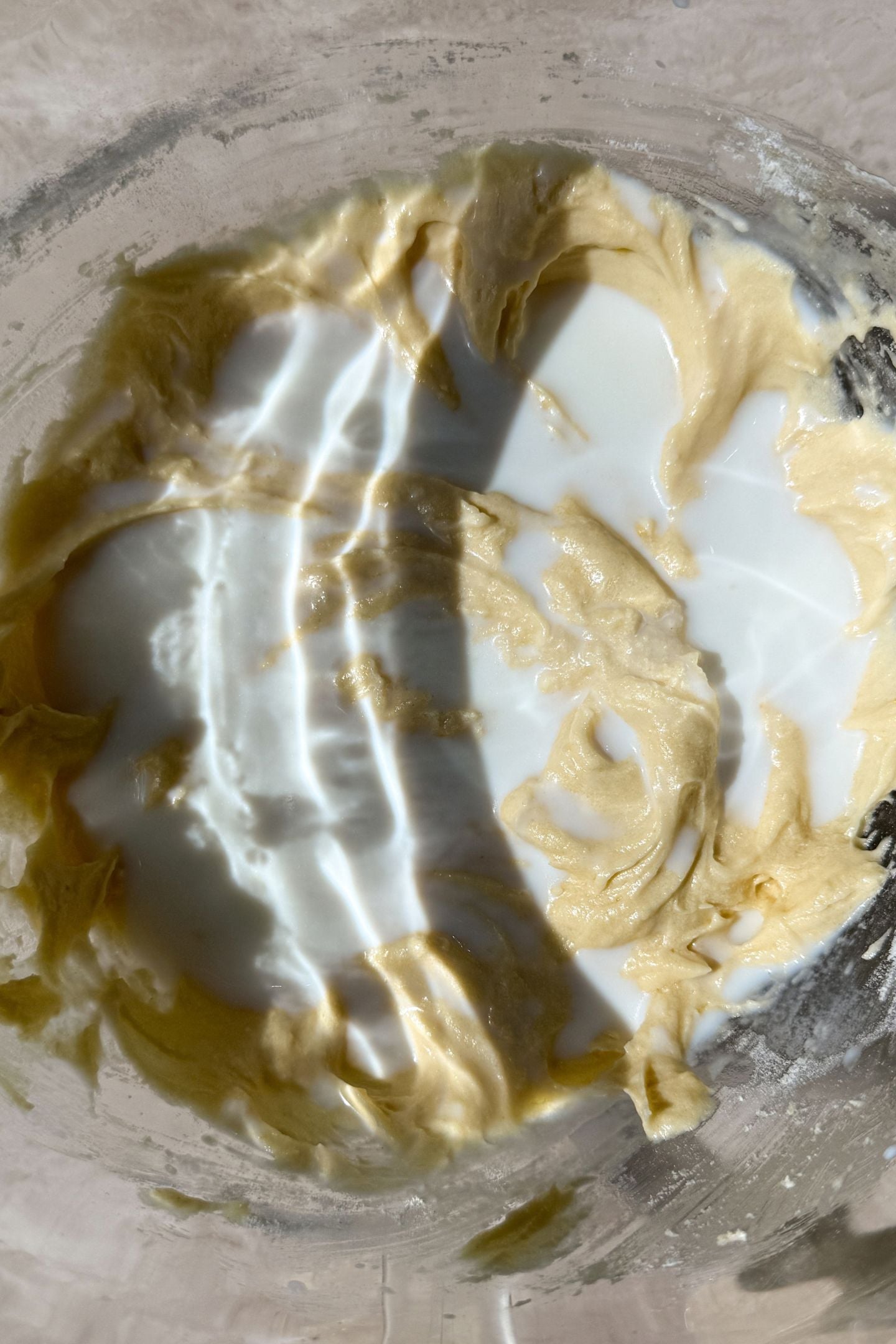 The remaining milk poured over the cupcake batter.
