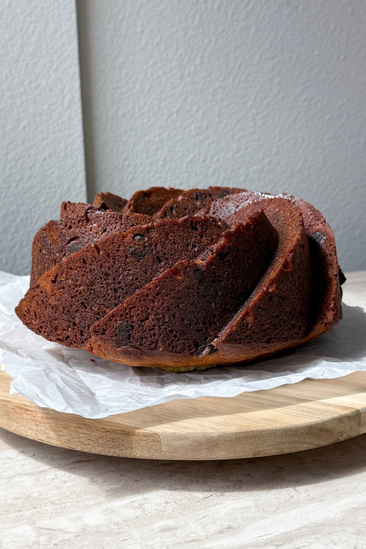 The cake is out of the pan and flipped upright.